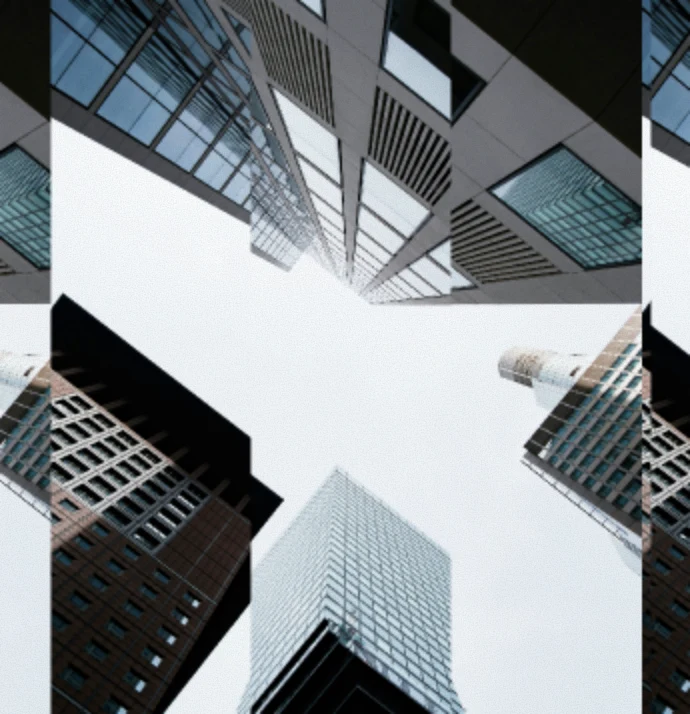 Glass office towers photographed from street level